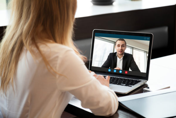 Two people video conferencing